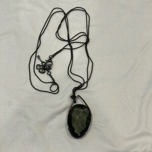 Fossil Pendant Necklace Clear Black Stone. Black Chain
